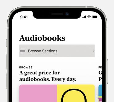 Close-up van een iPhone met daarop het startscherm van Apple Audiobooks