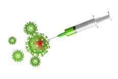 Spuit met vaccin dat coronacellen doodt